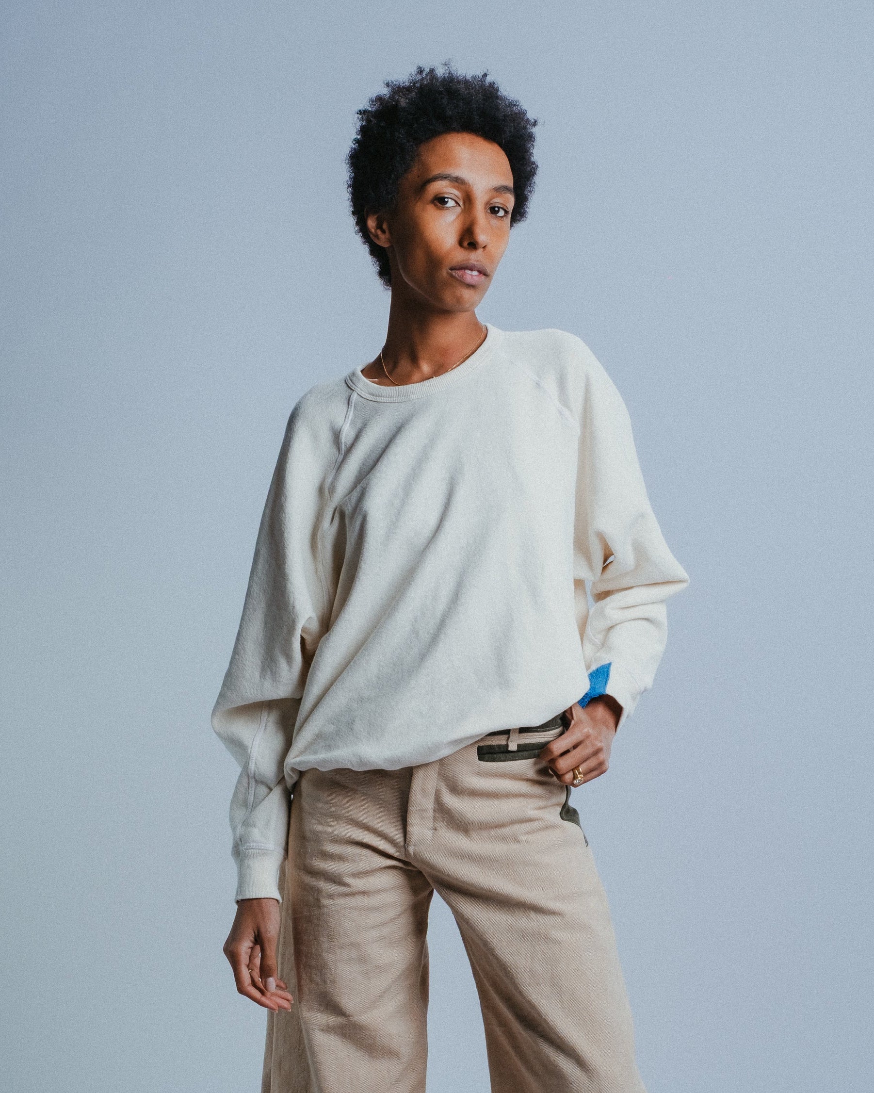 Crewneck Sweater in Off-White with Blue Terry Cloth Cutout